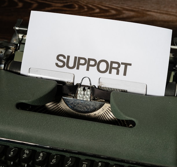 a close up of a typewriter with a paper on it